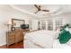 Spacious main bedroom features hardwood floors, large dresser, and ample natural light at 24 Rockland Pl, Decatur, GA 30030
