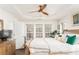 Well-lit main bedroom includes a large bed, dresser, and several bright windows at 24 Rockland Pl, Decatur, GA 30030