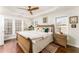 Bright main bedroom with hardwood floors, tray ceiling, and plenty of natural light at 24 Rockland Pl, Decatur, GA 30030