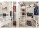 Organized walk-in closet with ample shelving and storage solutions for efficient space utilization at 24 Rockland Pl, Decatur, GA 30030