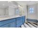 Elegant bathroom with double vanity, marble countertops, and stylish tile flooring at 325 William Falls Dr, Canton, GA 30114