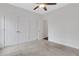 Bedroom with neutral carpet, ceiling fan and a walk-in closet at 325 William Falls Dr, Canton, GA 30114