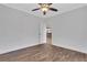 Bedroom with wood floors, ceiling fan and access to other rooms at 325 William Falls Dr, Canton, GA 30114