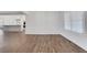 Spacious living area showcasing hardwood floors, an abundance of natural light, and modern design at 325 William Falls Dr, Canton, GA 30114