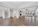 Open-concept living room with fireplace, abundant natural light, and hardwood floors at 325 William Falls Dr, Canton, GA 30114