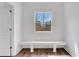 Bright mudroom featuring built-in bench seating and a window at 325 William Falls Dr, Canton, GA 30114