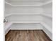 Well-organized pantry with ample shelving for storage at 325 William Falls Dr, Canton, GA 30114