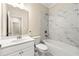 This bathroom features a sleek vanity, modern fixtures, and a luxurious soaking tub at 3538 Davenport Rd, Duluth, GA 30096
