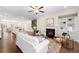 Spacious living room flowing into the kitchen and dining area, ideal for entertaining and modern living at 3538 Davenport Rd, Duluth, GA 30096