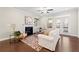 Cozy living room featuring a fireplace, plush seating, and natural light from the doors to the deck at 3538 Davenport Rd, Duluth, GA 30096