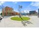Town square featuring landscaping, green space, and a variety of commercial buildings and dining options at 3538 Davenport Rd, Duluth, GA 30096
