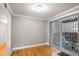 Bright dining room with hardwood floors and access to a patio through sliding glass doors at 5600 Kingsport Dr, Atlanta, GA 30342