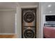 Convenient stacked washer and dryer unit in a closet, adjacent to living space at 5600 Kingsport Dr, Atlanta, GA 30342