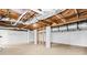 Unfinished basement with exposed duct work, wood framing and painted white walls at 3784 Robinson Ne Rd, Marietta, GA 30068