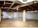 Spacious unfinished basement featuring concrete floors, white-painted supports and exposed ceiling with ductwork at 3784 Robinson Ne Rd, Marietta, GA 30068