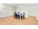Simple dining table featuring blue striped table cloth located near a doorway with lots of light at 3784 Robinson Ne Rd, Marietta, GA 30068