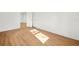 Bright room with wood-look floors, fresh paint, and plenty of natural light ready for your decor at 3784 Robinson Ne Rd, Marietta, GA 30068