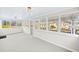 Large sunroom featuring windows and doors that look out to the exterior of the home at 3784 Robinson Ne Rd, Marietta, GA 30068