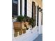 Close up of window box with flowering plants and black shutters on a white house at 3784 Robinson Ne Rd, Marietta, GA 30068