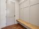 Mudroom features gray walls with wood trim accents, a wood bench and hardwood floors at 482 Majestic Oaks Pl, Smyrna, GA 30082