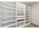 Walk-in closet featuring a closet organizer with shelves and drawers at 482 Majestic Oaks Pl, Smyrna, GA 30082