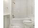 Bright bathroom featuring white subway tile in the shower and white tile flooring at 1705 Evans, Atlanta, GA 30310