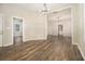 Open-concept living area with stylish flooring and multiple doorways leading to other rooms at 1705 Evans, Atlanta, GA 30310
