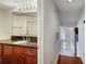 Well-lit bathroom features a dark granite countertop, decorative light fixtures, and a tiled shower at 4254 River Green Nw Dr # 611, Atlanta, GA 30327