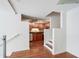 Open-concept kitchen featuring wood cabinetry, stainless steel appliances, and modern finishes at 4254 River Green Nw Dr # 611, Atlanta, GA 30327