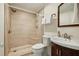 Modern bathroom featuring a walk-in shower with neutral tile and a sleek vanity with a vessel sink at 555 Brickleberry Ln, Roswell, GA 30075