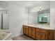 Bathroom with a large vanity and soaking tub at 555 Brickleberry Ln, Roswell, GA 30075