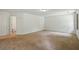 Large bedroom featuring plush carpeting and an ensuite bathroom at 555 Brickleberry Ln, Roswell, GA 30075
