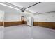 Spacious garage with epoxy flooring and ample storage space at 555 Brickleberry Ln, Roswell, GA 30075