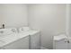 Functional laundry room equipped with white washer and dryer at 555 Brickleberry Ln, Roswell, GA 30075