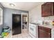 Well-lit kitchen with modern appliances, including a gas range and white tiling at 1210 Stoneybrook Rd, Forest Park, GA 30297