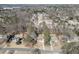 Bird's eye view of a neighborhood with single-Gathering homes nestled among mature trees at 2222 Ivy Crest Dr, Buford, GA 30519