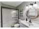 Updated bathroom featuring a shower, toilet, and stylish vanity with decor at 2222 Ivy Crest Dr, Buford, GA 30519