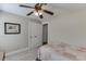 Bedroom with neutral walls and doors leading to additional rooms, including a closet at 2222 Ivy Crest Dr, Buford, GA 30519