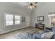 Bright living room features vaulted ceiling, neutral walls, and stylish decor and furnishings at 2222 Ivy Crest Dr, Buford, GA 30519