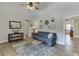 Sunlit living room features vaulted ceiling, neutral walls, and stylish decor and furnishings at 2222 Ivy Crest Dr, Buford, GA 30519