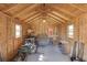 Interior of shed with workbench, natural light, and wooden walls at 2222 Ivy Crest Dr, Buford, GA 30519