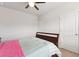 Cozy bedroom with a ceiling fan, plush carpets, and a comfortable bed at 981 Sonoma Dr, Lawrenceville, GA 30045