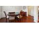 Dining room with hardwood floors and wainscotting at 981 Sonoma Dr, Lawrenceville, GA 30045