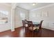 Dining room with hardwood floors, wainscotting, and lots of light at 981 Sonoma Dr, Lawrenceville, GA 30045