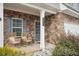 Inviting front porch with stone accents, rocking chairs, and stylish decor at 981 Sonoma Dr, Lawrenceville, GA 30045