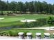 Scenic golf course view features lush green fairways, sand traps and a water hazard at 986 Carl Sanders Dr, Acworth, GA 30101