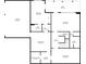 Basement floor plan showcasing the layout with a kitchenette, bedroom, patio, garage, and bathrooms at 1865 Butlers Ln, Decatur, GA 30033