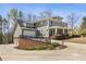 Side of house showcasing garage and well maintained landscape and hardscape at 1865 Butlers Ln, Decatur, GA 30033