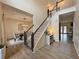 Foyer features a staircase leading to the second floor and a view to the dining room at 2585 Kirkstone Dr, Buford, GA 30519