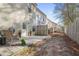 View of the backyard patio area for townhouse residents at 2939 Greyhawk Ln, Cumming, GA 30040